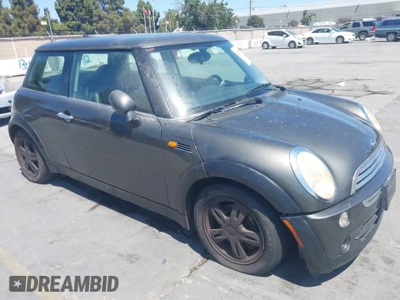 ✅ 2006 MINI Hardtop • VIN: WMWRC33516TJ78883 • Lot: 42955673. Listed on IAAI with 91,920 mi. Free auction sales archive from the USA and detailed vehicle history report at DreamBid. Image 1.