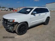 ✅ 2014 Jeep Grand Cherokee Summit • VIN: 1C4RJFJG9EC476126 • Lot: 43468707. Listed on IAAI with 143,755 mi. Free auction sales archive from the USA and detailed vehicle history report at DreamBid. Image 22.