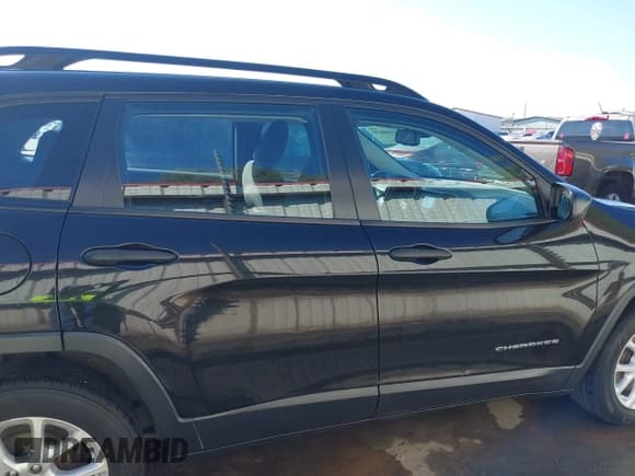 ✅ 2015 Jeep Cherokee Sport • VIN: 1C4PJLAB2FW616995 • Lot: 43384570. Listed on IAAI with 103,934 mi. Free auction sales archive from the USA and detailed vehicle history report at DreamBid. Image 13.