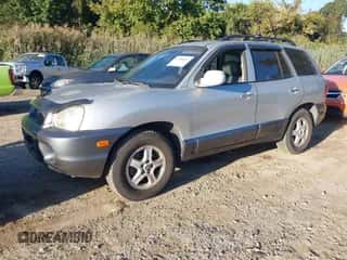 2004 Hyundai Santa Fe GLS z VIN KM8SC73E34U704154, wystawiony jako IAAI lot #43380665 z przebiegiem 68 777 mil mil oraz . Historia ofert i sprzedaży dostępna na DreamBid. Obrazek 2.