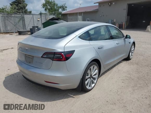 ✅ 2018 Tesla Model 3 Long Range Battery • VIN: 5YJ3E1EB7JF087610 • Лот: 42913515. Опубликован ранее на IAAI с пробегом 51 986 миль. Бесплатный доступ к архиву аукционных продаж из США и подробный отчёт об истории автомобиля на DreamBid. Изображение 4.