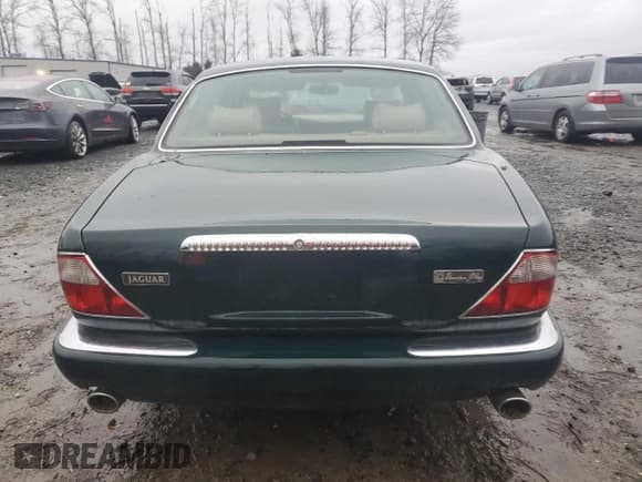 ✅ 2000 Jaguar XJ • VIN: SAJDA25BXYMF01667 • Лот: 41333495. Опубликован ранее на Copart с пробегом 102 291 миль. Бесплатный доступ к архиву аукционных продаж из США и подробный отчёт об истории автомобиля на DreamBid. Изображение 6.