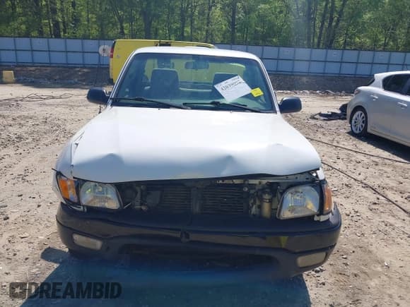 ✅ 2004 Toyota Tacoma • VIN: 5TENL42N74Z412936 • Lot: 42039092. Listed on IAAI with 289,926 mi. Free auction sales archive from the USA and detailed vehicle history report at DreamBid. Image 13.