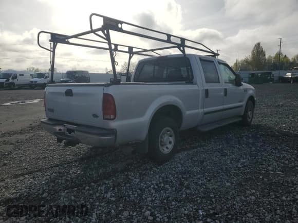 ✅ 2003 Ford F-250 XL • VIN: 1FTNW20PX3ED26912 • Lot: 52461075. Listed on Copart with 90,804 mi. Free auction sales archive from the USA and detailed vehicle history report at DreamBid. Image 3.