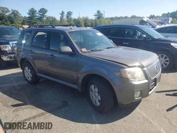✅ 2011 Mercury Mariner • VIN: 4M2CN9BG3BKJ02634 • Lot: 80093665. Listed on Copart with 158,343 mi. Free auction sales archive from the USA and detailed vehicle history report at DreamBid. Image 4.