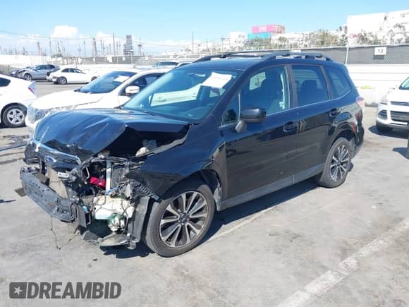 2017 Subaru Forester Premium with VIN JF2SJGEC8HH808466, listed as a IAAI auction lot 43250728 with 147,399 mi miles and . Bid and sale history available at DreamBid. Image 19.