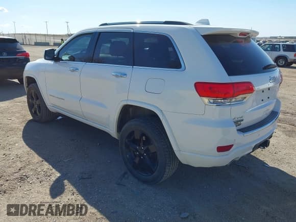 ✅ 2015 Jeep Grand Cherokee Overland • VIN: 1C4RJFCM2FC737133 • Лот: 42012000. Опубликован ранее на IAAI с пробегом 132 928 миль. Бесплатный доступ к архиву аукционных продаж из США и подробный отчёт об истории автомобиля на DreamBid. Изображение 3.