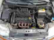 2007 Chevrolet Aveo LS z VIN KL1TD66687B787785, wystawiony jako Copart lot #69248174 z przebiegiem 107 959 mil mil oraz Szkoda całkowita • Salvage title. Historia ofert i sprzedaży dostępna na DreamBid. Obrazek 13.