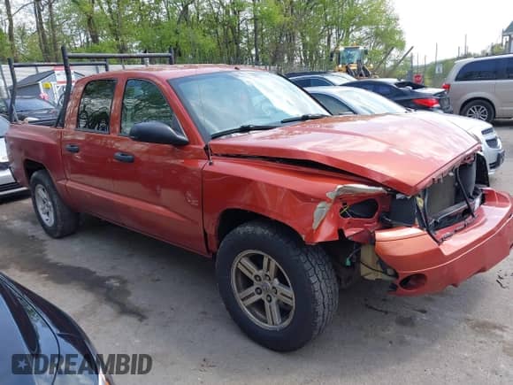 2007 Dodge Dakota SLT with VIN 1D7HW48K87S270838, listed as a IAAI auction lot 42150101 with 225,761 mi miles and . Bid and sale history available at DreamBid. Image 1.