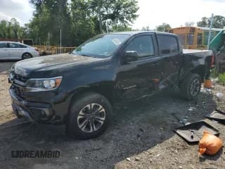 ✅ 2021 Chevrolet Colorado 4WD Z71 • VIN: 1GCGTDEN1M1112808 • Лот: 64644555. Опубликован ранее на Copart с пробегом 84 751 миль. Бесплатный доступ к архиву аукционных продаж из США и подробный отчёт об истории автомобиля на DreamBid. Изображение 1.