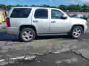 2011 Chevrolet Tahoe LTZ with VIN 1GNSKCE01BR231833, listed as a IAAI auction lot 43053303 with 247,341 mi miles and . Bid and sale history available at DreamBid. Image 13.