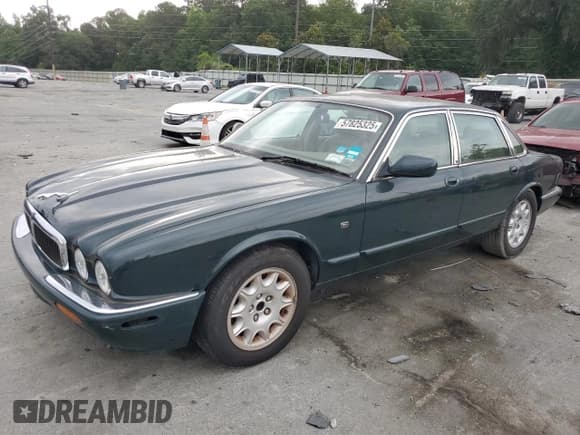 ✅ 1999 Jaguar XJ • VIN: SAJHX1044XC865054 • Lot: 57825325. Wystawiony na Copart z przebiegiem 71 145 mil. Bezpłatny archiwum sprzedaży aukcyjnych z USA i szczegółowy raport historii pojazdu na DreamBid. Zdjęcie 1.