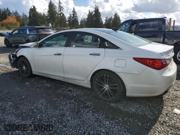 ✅ 2013 Hyundai Sonata SE • VIN: 5NPEC4AB1DH548067 • Lot: 76633254. Listed on Copart with 96,008 mi. Free auction sales archive from the USA and detailed vehicle history report at DreamBid. Image 2.