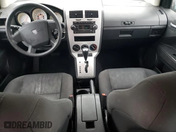 ✅ 2008 Dodge Caliber SE • VIN: 1B3HB28B48D774918 • Лот: 80624034. Опубликован ранее на Copart с пробегом 190 597 миль. Бесплатный доступ к архиву аукционных продаж из США и подробный отчёт об истории автомобиля на DreamBid. Изображение 8.