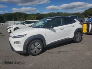 ✅ 2021 Hyundai Kona SEL • VIN: KM8K23AG6MU128169 • Лот: 84478165. Опубликован ранее на Copart с пробегом 124 196 миль. Бесплатный доступ к архиву аукционных продаж из США и подробный отчёт об истории автомобиля на DreamBid. Изображение 1.