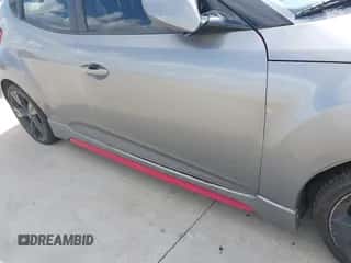 2014 Hyundai Veloster z VIN KMHTC6AD1EU182487, wystawiony jako IAAI lot #43479609 z przebiegiem 71 862 mil mil oraz . Historia ofert i sprzedaży dostępna na DreamBid. Obrazek 6.