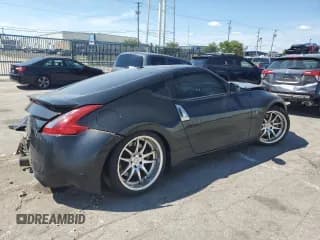 ✅ 2009 Nissan 370Z Touring • VIN: JN1AZ44EX9M407369 • Лот: 66755474. Опубликован ранее на Copart с пробегом 124 031 миль. Бесплатный доступ к архиву аукционных продаж из США и подробный отчёт об истории автомобиля на DreamBid. Изображение 3.