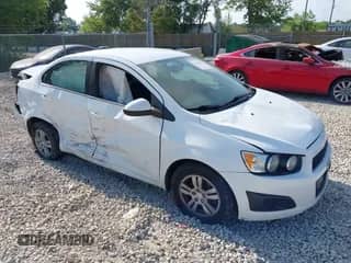 2016 Chevrolet Sonic LT z VIN 1G1JC5SH2G4134211, wystawiony jako IAAI lot #42851980 z przebiegiem 156 618 mil mil oraz . Historia ofert i sprzedaży dostępna na DreamBid. Obrazek 1.