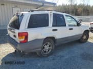 ✅ 2002 Jeep Grand Cherokee Laredo • VIN: 1J4GW48N62C119509 • Lot: 50392685. Listed on Copart with 194,894 mi. Free auction sales archive from the USA and detailed vehicle history report at DreamBid. Image 3.