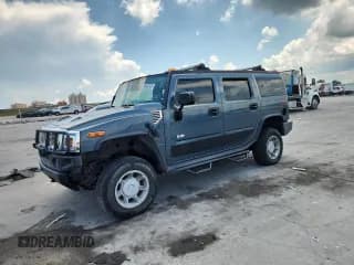 ✅ 2005 Hummer H2 SUV • VIN: 5GRGN23U65H117101 • Lot: 69992825. Wystawiony na Copart z przebiegiem Nie podano. Bezpłatny archiwum sprzedaży aukcyjnych z USA i szczegółowy raport historii pojazdu na DreamBid. Zdjęcie 1.
