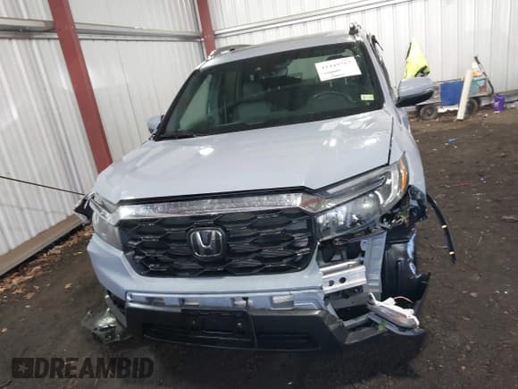 ✅ 2022 Honda Passport EX-L • VIN: 5FNYF7H52NB000679 • Lot: 41449757. Listed on IAAI with 38,672 mi. Free auction sales archive from the USA and detailed vehicle history report at DreamBid. Image 12.