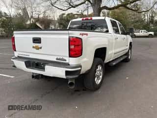 2015 Chevrolet Silverado 3500HD High Country с VIN 1GC4K1E86FF585320, выставлен на аукционе Copart как лот 45056365 с пробегом 184 776 миль миль и Списание • Salvage title. История ставок и продаж доступна на DreamBid. Изображение 4.