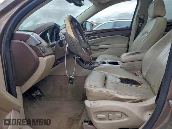 ✅ 2012 Cadillac SRX Performance Collection • VIN: 3GYFNBE37CS532590 • Lot: 94237585. Listed on Copart with 166,412 mi. Free auction sales archive from the USA and detailed vehicle history report at DreamBid. Image 7.