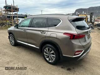 ✅ 2019 Hyundai Santa Fe Preferred • VIN: 5NMS3CAA0KH025038 • Лот: 91679145. Опубликован ранее на Copart с пробегом 96 466 миль. Бесплатный доступ к архиву аукционных продаж из США и подробный отчёт об истории автомобиля на DreamBid. Изображение 3.