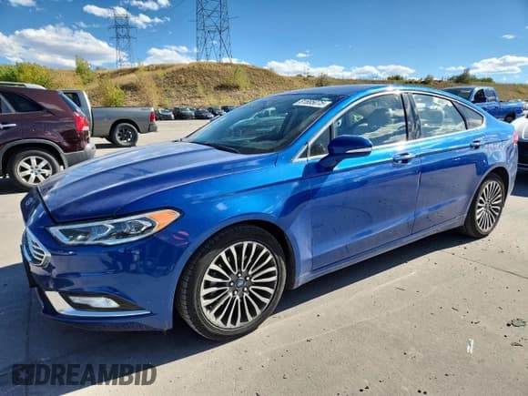 ✅ 2018 Ford Fusion Titanium • VIN: 3FA6P0D91JR268769 • Lot: 81695075. Wystawiony na Copart z przebiegiem 75 875 mil. Bezpłatny archiwum sprzedaży aukcyjnych z USA i szczegółowy raport historii pojazdu na DreamBid. Zdjęcie 1.