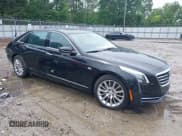 ✅ 2018 Cadillac CT6 AWD • VIN: 1G6KB5RS9JU100454 • Lot: 42376534. Listed on IAAI with 46,938 mi. Free auction sales archive from the USA and detailed vehicle history report at DreamBid. Image 1.