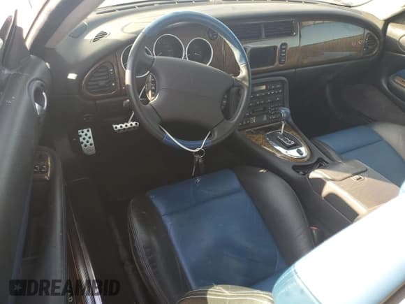 ✅ 2004 Jaguar XK • VIN: SAJDA42B443A38098 • Lot: 77311844. Listed on Copart with Not provided. Free auction sales archive from the USA and detailed vehicle history report at DreamBid. Image 8.