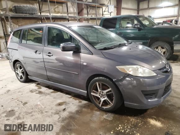 ✅ 2009 Mazda 5 Sport • VIN: JM1CR293890331482 • Лот: 51682375. Опубликован ранее на Copart с пробегом 168 454 миль. Бесплатный доступ к архиву аукционных продаж из США и подробный отчёт об истории автомобиля на DreamBid. Изображение 4.