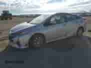 2021 Toyota Prius LE z VIN JTDKAMFP6M3174337, wystawiony jako Copart lot #81413265 z przebiegiem 142 475 mil mil oraz Szkoda całkowita • Salvage title. Historia ofert i sprzedaży dostępna na DreamBid. Obrazek 1.