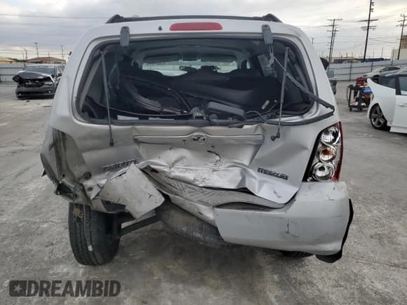 ✅ 2006 Mazda Tribute i • VIN: 4F2YZ02Z56KM29507 • Lot: 43687275. Wystawiony na Copart z przebiegiem 192 478 mil. Bezpłatny archiwum sprzedaży aukcyjnych z USA i szczegółowy raport historii pojazdu na DreamBid. Zdjęcie 6.