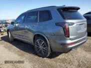 ✅ 2022 Cadillac XT6 Sport • VIN: 1GYKPGRS3NZ142843 • Lot: 47843925. Listed on Copart with 26,668 mi. Free auction sales archive from the USA and detailed vehicle history report at DreamBid. Image 2.