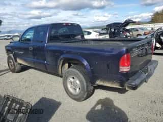 1999 Dodge Dakota SLT z VIN 1B7GG22YXXS235254, wystawiony jako Copart lot #72859554 z przebiegiem 172 272 mil mil oraz Szkoda całkowita • Salvage title. Historia ofert i sprzedaży dostępna na DreamBid. Obrazek 2.