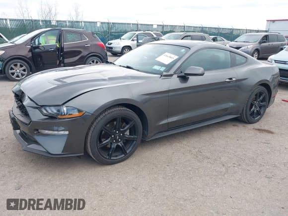 ✅ 2018 Ford Mustang EcoBoost • VIN: 1FA6P8TH0J5103113 • Lot: 43645805. Listed on IAAI with 52,797 mi. Free auction sales archive from the USA and detailed vehicle history report at DreamBid. Image 2.