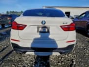 ✅ 2015 BMW X4 xDrive28i • VIN: 5UXXW3C52F0M87926 • Lot: 94218295. Listed on Copart with 94,567 mi. Free auction sales archive from the USA and detailed vehicle history report at DreamBid. Image 6.