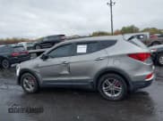✅ 2018 Hyundai Santa Fe 2.4L • VIN: 5NMZTDLB2JH095519 • Лот: 43462708. Опубликован ранее на IAAI с пробегом 87 498 миль. Бесплатный доступ к архиву аукционных продаж из США и подробный отчёт об истории автомобиля на DreamBid. Изображение 14.