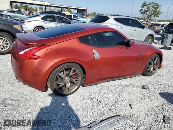✅ 2013 Nissan 370Z • VIN: JN1AZ4EH5DM382852 • Лот: 51109385. Опубликован ранее на Copart с пробегом 106 940 миль. Бесплатный доступ к архиву аукционных продаж из США и подробный отчёт об истории автомобиля на DreamBid. Изображение 3.