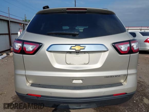 ✅ 2014 Chevrolet Traverse LT • VIN: 1GNKRHKD7EJ169048 • Lot: 42332958. Listed on IAAI with 184,819 mi. Free auction sales archive from the USA and detailed vehicle history report at DreamBid. Image 16.