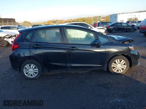 ✅ 2015 Honda Fit LX • VIN: 3HGGK5G59FM721416 • Lot: 43493751. Wystawiony na IAAI z przebiegiem Nie podano. Bezpłatny archiwum sprzedaży aukcyjnych z USA i szczegółowy raport historii pojazdu na DreamBid. Zdjęcie 13.