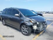 ✅ 2014 Toyota Sienna SE • VIN: 5TDXK3DC7ES487541 • Lot: 42998929. Listed on IAAI with 214,475 mi. Free auction sales archive from the USA and detailed vehicle history report at DreamBid. Image 1.