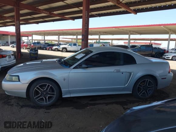 ✅ 2002 Ford Mustang Standard • VIN: 1FAFP404X2F143723 • Lot: 42479151. Listed on IAAI with 160,810 mi. Free auction sales archive from the USA and detailed vehicle history report at DreamBid. Image 14.