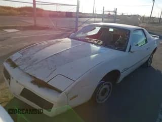 ✅ 1984 Pontiac Firebird • VIN: 1G2AS8719EL262458 • Lot: 43611020. Listed on IAAI with 104,068 mi. Free auction sales archive from the USA and detailed vehicle history report at DreamBid. Image 2.