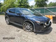 ✅ 2019 Mazda CX-5 Grand Touring • VIN: JM3KFBDMXK1639376 • Lot: 65414215. Listed on Copart with 63,202 mi. Free auction sales archive from the USA and detailed vehicle history report at DreamBid. Image 4.
