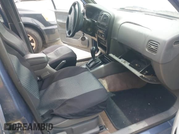 ✅ 2002 Kia Sportage • VIN: KNDJB723525162145 • Лот: 42468042. Опубликован ранее на IAAI с пробегом 208 697 миль. Бесплатный доступ к архиву аукционных продаж из США и подробный отчёт об истории автомобиля на DreamBid. Изображение 5.