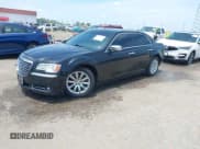 ✅ 2012 Chrysler 300 C • VIN: 2C3CCAET4CH288784 • Lot: 39522457. Listed on IAAI with 185,234 mi. Free auction sales archive from the USA and detailed vehicle history report at DreamBid. Image 2.