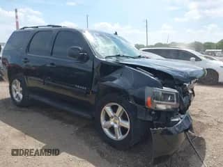2011 Chevrolet Tahoe LT with VIN 1GNSCBE01BR154212, listed as a IAAI auction lot 42651099 with 245,088 mi miles and . Bid and sale history available at DreamBid. Image 1.