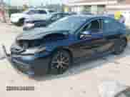 2021 Toyota Camry SE with VIN 4T1T11BKXMU042040, listed as a IAAI auction lot 42879951 with 35,130 mi miles and . Bid and sale history available at DreamBid. Image 17.